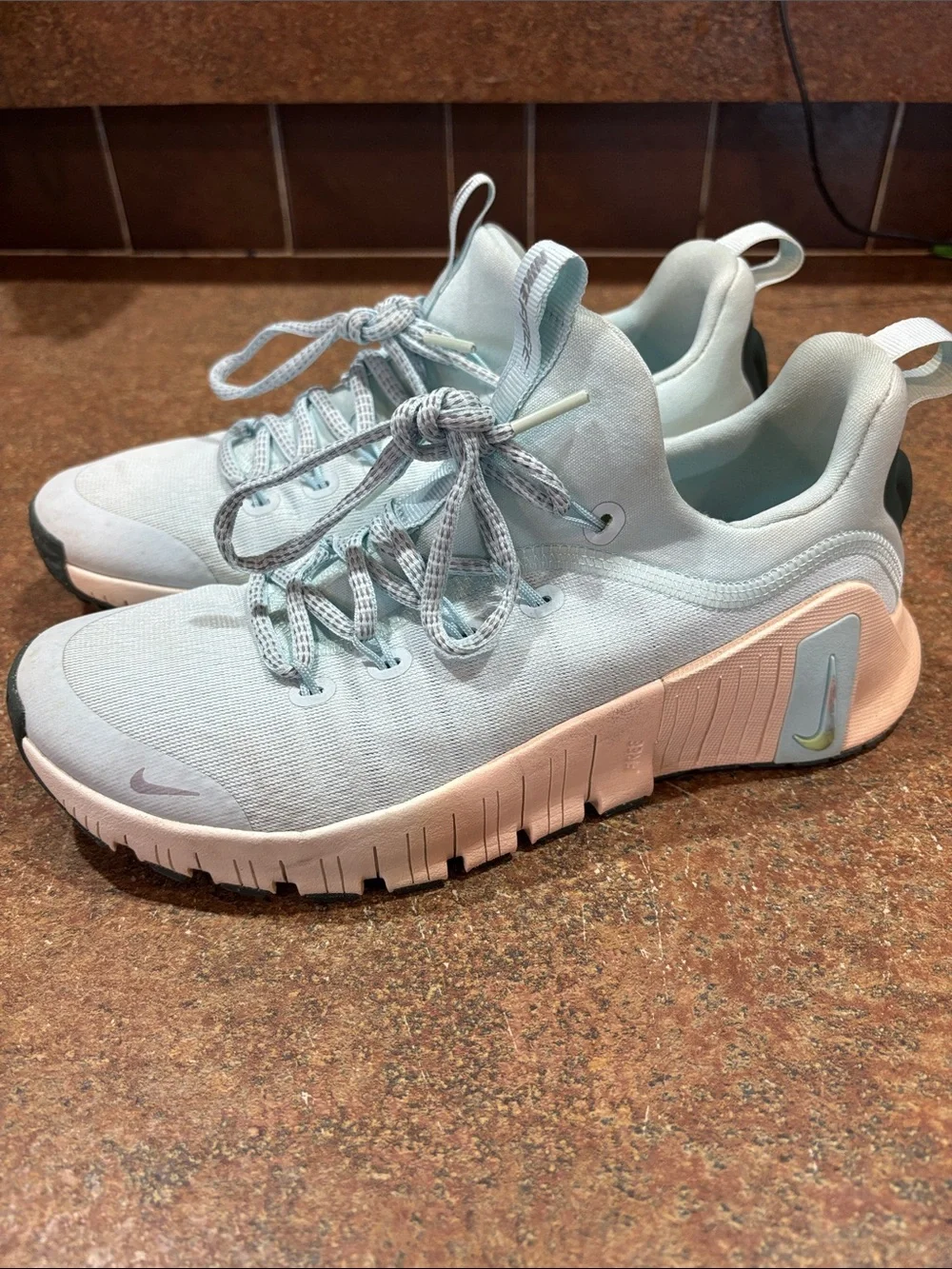 Nike Women’s Pale Blue and Light Pink Training Sneakers